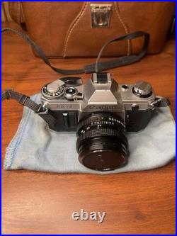 Vintage Canon AE-1 SLR Camera Kit Silver Black with Lenses Flash Accessories