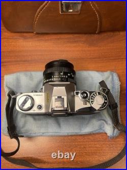 Vintage Canon AE-1 SLR Camera Kit Silver Black with Lenses Flash Accessories
