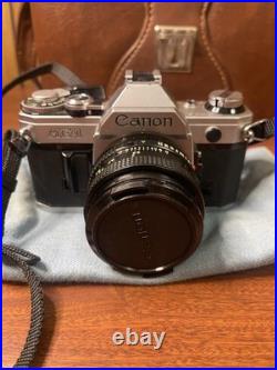 Vintage Canon AE-1 SLR Camera Kit Silver Black with Lenses Flash Accessories