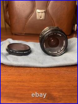 Vintage Canon AE-1 SLR Camera Kit Silver Black with Lenses Flash Accessories