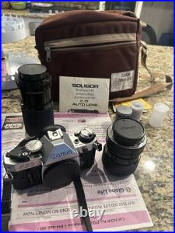 Vintage Canon AE-1 program Camera Lot With 2 Lenses Flash & Carry Bag