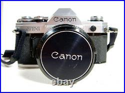 Vintage Canon AT-1 SLR 35 MM Camera and Several Lenses Flash Book Tested