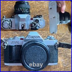 Vintage Canon AV-1 SLR 28mm Camera, Marco Lens, 2 Flashes And Samsonite Bag