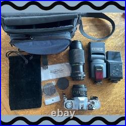 Vintage Canon AV-1 SLR 28mm Camera, Marco Lens, 2 Flashes And Samsonite Bag