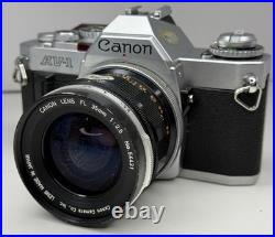 Vintage Canon AV-1 SLR 35mm Film Camera With Canon FL 35mm 12.5 Lens -Film Tested Vintage Canon AV-1 SLR 35mm Film Camera With Canon FL 35mm 12.5 Lens -Film Tested