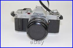 Vintage Canon AV-1 SLR Camera With Multiple Lenses-Case+Extras Tested