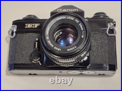 Vintage Canon EF black body 35mm SLR camera with 50mm 1.8 FD lens, extra body