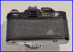 Vintage Canon EF black body 35mm SLR camera with 50mm 1.8 FD lens, extra body Vintage Canon EF black body 35mm SLR camera with 50mm 1.8 FD lens, extra body