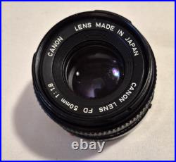 Vintage Canon EF black body 35mm SLR camera with 50mm 1.8 FD lens, extra body