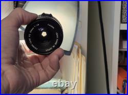 Vintage Canon EF black body 35mm SLR camera with 50mm 1.8 FD lens, extra body