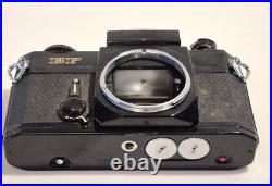 Vintage Canon EF black body 35mm SLR camera with 50mm 1.8 FD lens, extra body Vintage Canon EF black body 35mm SLR camera with 50mm 1.8 FD lens, extra body