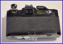 Vintage Canon EF black body 35mm SLR camera with 50mm 1.8 FD lens, extra body Vintage Canon EF black body 35mm SLR camera with 50mm 1.8 FD lens, extra body