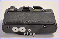 Vintage Canon EF black body 35mm SLR camera with 50mm 1.8 FD lens, extra body Vintage Canon EF black body 35mm SLR camera with 50mm 1.8 FD lens, extra body