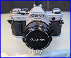 Vintage Canon SLR Camera with 50mm Lens And Other Included Accessories