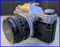 Vintage Canon SLR Camera with 50mm Lens And Other Included Accessories