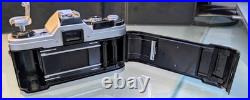 Vintage Canon SLR Camera with 50mm Lens And Other Included Accessories