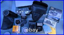 Vintage Canon SLR Camera with 50mm Lens And Other Included Accessories