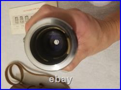 Vintage Canon Serenar lens 135mm f3.5 with leather carrying case