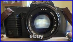 Vintage Canon T70 35mm Camera Comes With FD 50mm 11.4 Lens Very Good Condition