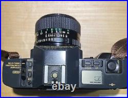 Vintage Canon T70 35mm Camera Comes With FD 50mm 11.4 Lens Very Good Condition