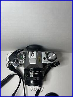 Vintage Canon ae-1 program 35mm film camera Chrome with 50mm lens Tested Working