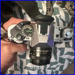 Vintage CanonAE-1 Program 35mm SLR Film Camera with FD 50mm f/1.8 Lens case/strap Vintage CanonAE-1 Program 35mm SLR Film Camera with FD 50mm f/1.8 Lens case/strap