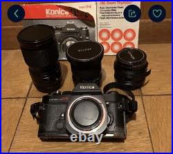 Vintage Konica Autoreflex T4 35mm Camera + 28mm Lens + 50mm Lens + Zoom Lens