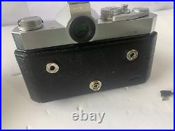 Vintage Konica T 35 MM Camera with52mm f/1.8 Lens, 135mm f/3.5 Lens & 35-75mm Lens