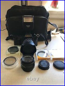 Vintage Lot Canon T50 35mm Camera With 2 Lenses 6 filters/flash/bag and more