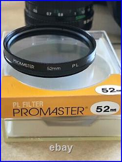 Vintage Lot Canon T50 35mm Camera With 2 Lenses 6 filters/flash/bag and more