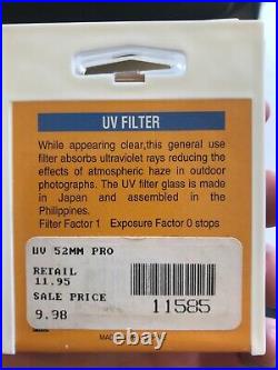 Vintage Lot Canon T50 35mm Camera With 2 Lenses 6 filters/flash/bag and more