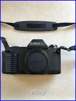 Vintage Lot Canon T50 35mm Camera With 2 Lenses 6 filters/flash/bag and more