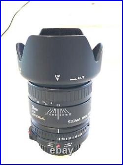 Vintage Lot Canon T50 35mm Camera With 2 Lenses 6 filters/flash/bag and more