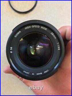 Vintage Lot Canon T50 35mm Camera With 2 Lenses 6 filters/flash/bag and more