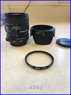 Vintage Lot Canon T50 35mm Camera With 2 Lenses 6 filters/flash/bag and more