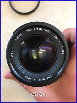 Vintage Lot Canon T50 35mm Camera With 2 Lenses 6 filters/flash/bag and more