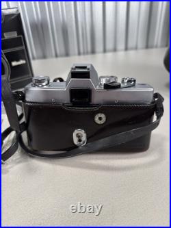 Vintage Minolta SR-T 101 35mm SLR Film Camera with MC Rokkor 55mm f/1.7 Lens