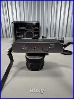 Vintage Minolta SR-T 101 35mm SLR Film Camera with MC Rokkor 55mm f/1.7 Lens