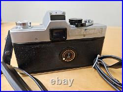 Vintage Minolta SRT 101 35mm Film Camera with58mm Rokkor Lens and Carrying Case