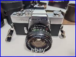 Vintage Minolta SRT 202 35MM CAMERA bundle with3 lenses, Leather case and manual