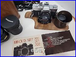 Vintage Minolta SRT 202 35MM CAMERA bundle with3 lenses, Leather case and manual