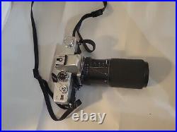 Vintage Minolta Srt 201 Camera With 70-210mm f/4 Zoom Lens And Bonus Lens