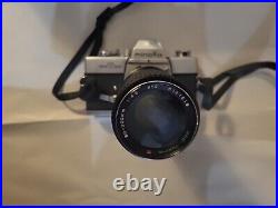 Vintage Minolta Srt 201 Camera With 70-210mm f/4 Zoom Lens And Bonus Lens