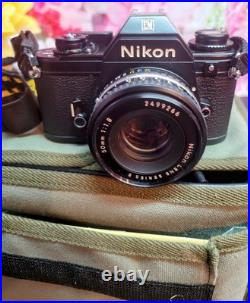 Vintage NEW Nikon EM Film Camera with Additional Lens