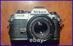 Vintage NIKON FG-20 35mm film camera, with 50mm f1.8 & 80-200 f4.5 zoom lens