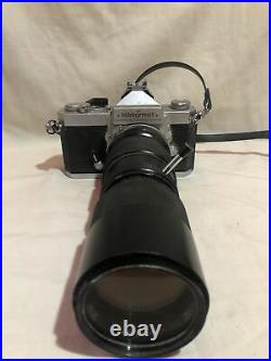 Vintage Nikkormat 35mm film camera with 85mm- 205mm lens