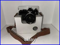 Vintage Nikon Camera Nikkor 50mm 12 Lens Japan Wooden Stand Lester A. Dine