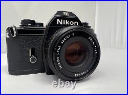 Vintage Nikon EM 35mm Camera With Series E 50mm 11.8 Lens Near Mint Works Great