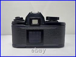 Vintage Nikon EM 35mm Camera With Series E 50mm 11.8 Lens Near Mint Works Great