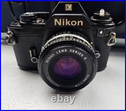 Vintage Nikon EM Film Camera With Hard Case And 16 Assorted Lens & Accessories